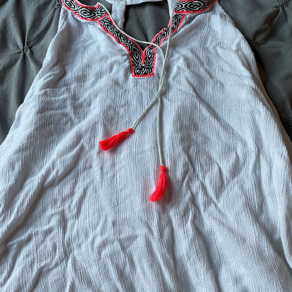 White open back tank top with neon orange